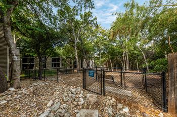 Two scenic dog parks with pet washing stations and outdoor lighting